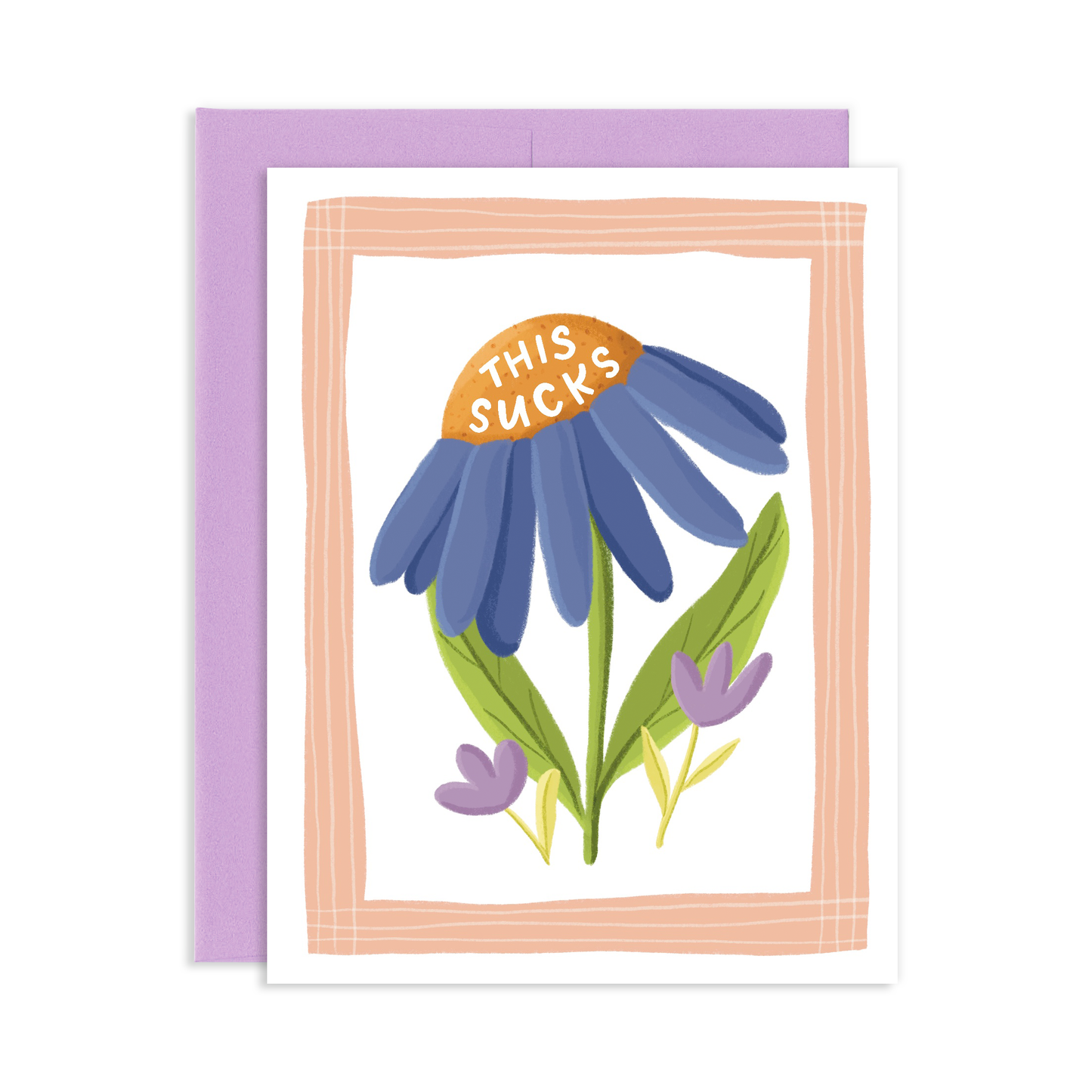 Greeting card with a peach color border and blue daisy flower in the center that reads This Sucks with a purple envelope.