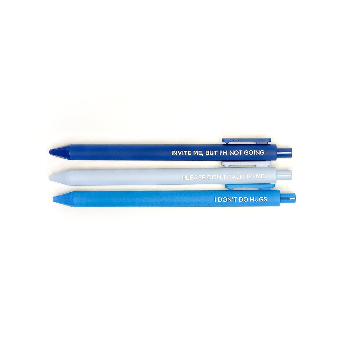 set of 3 pens in different shades of blue with introvert sayings on white background