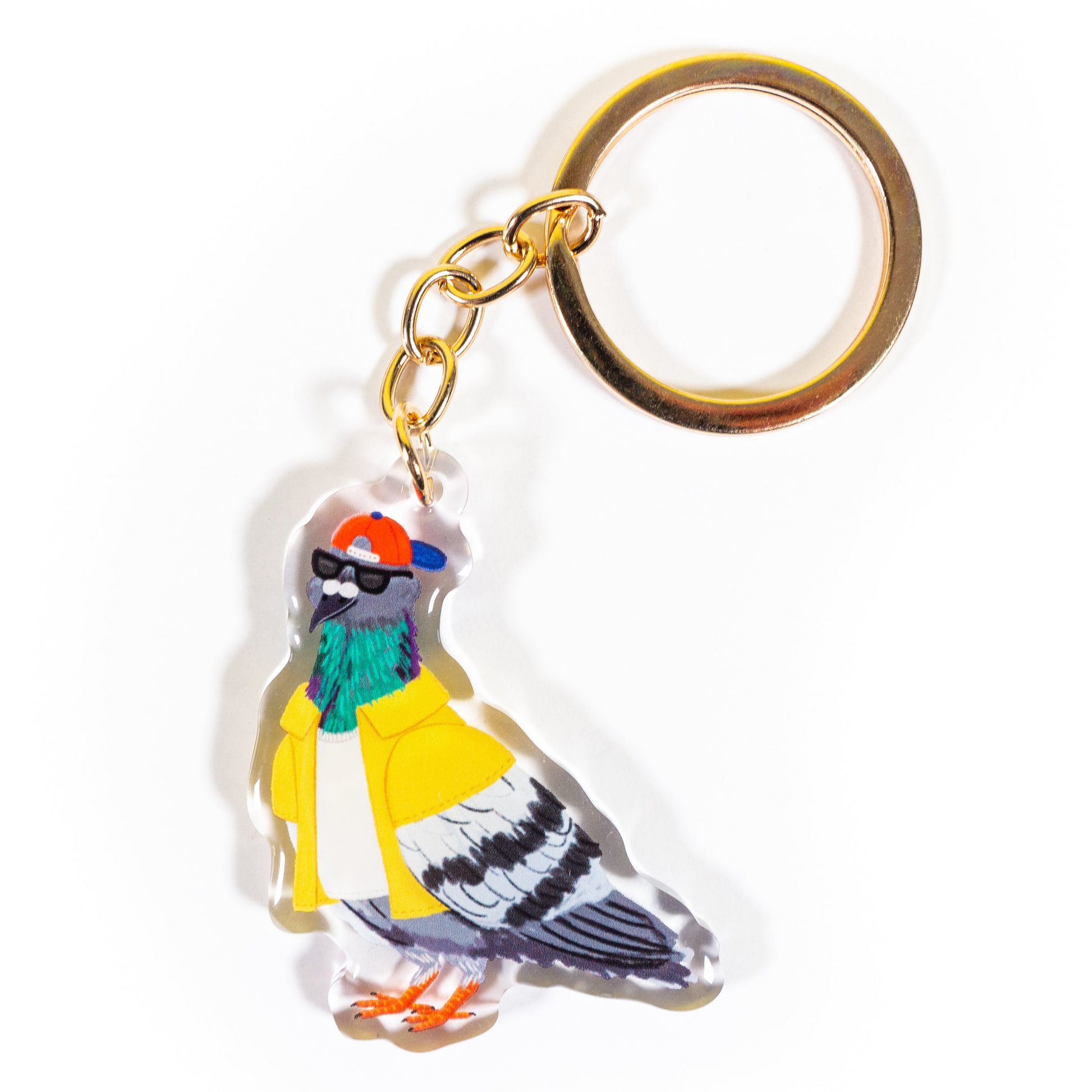 Cool pigeon wearing sunglasses and yellow hat clear acrylic keychain with gold ring  on white background