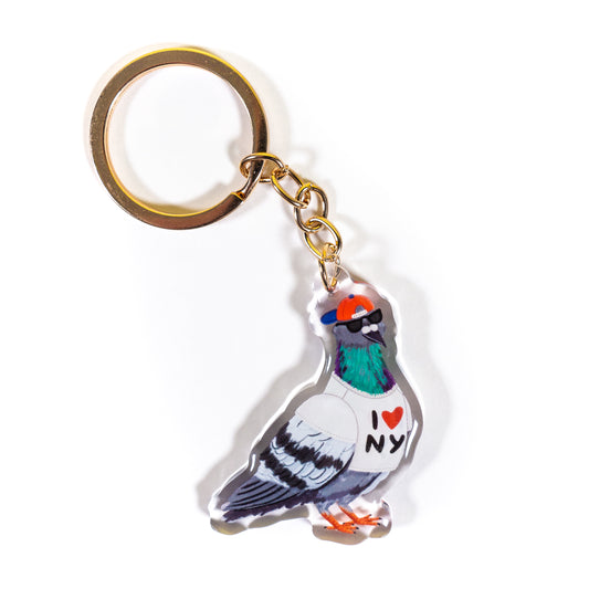 Cool pigeon wearing I Love NY t-shirt clear acrylic keychain with gold ring showing fashionable bird in sunglasses and baseball cap on white background - Grey Street Paper