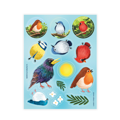 A sheet of paper stickers featuring various illustrations of different birds, including a Cardinal, European Robin, Eurasian Blue Tit, European Starling, and Mountain Blue Bird, with a background of a clear blue sky.