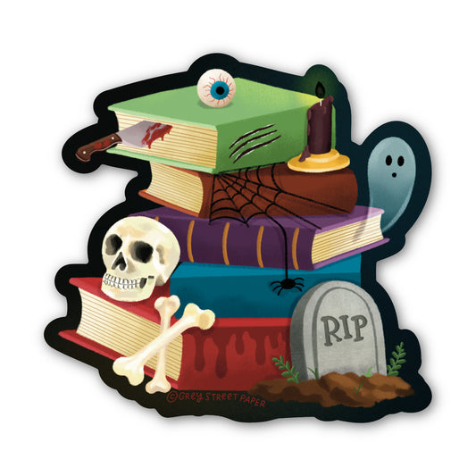 Horror Halloween-themed book stack with books, skull, bones, and tombstone on a white background