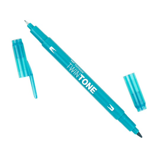 A Tombow TwinTone marker in emerald green with a cap and a dual-tip design for broad and extra-fine lines.